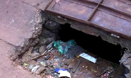 Nữ sinh Bình Phước bị nước mưa cuốn vào miệng cống mất tích