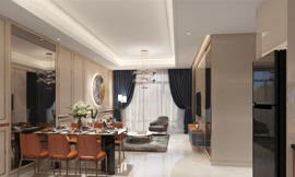 Thiết kế phòng khách sử dụng tông màu vàng hồng, cam đất và xanh đậm ấm áp và sang trọng