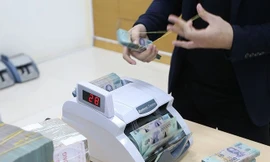 Trong ngày 12/11, Ngân hàng Nhà nước bơm ròng 4.000 tỷ đồng ra thị trường, đưa khối lượng lưu hành trên kênh cầm cố tăng lên mức 56.658 tỷ đồng - Ảnh: Quang Phúc.