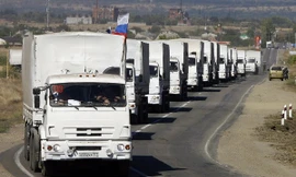 Đoàn xe chở hàng viện trợ của Nga tại trạm kiểm soát khu vực biên giới Donetsk-Izvarino ngày 19/9. 