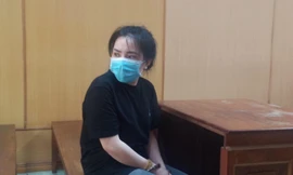 Vũ Thị Tâm tại phiên tòa sáng nay 22/3. Ảnh: Tân Châu