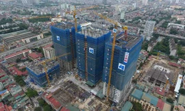 Các tòa căn hộ thuộc dự án TNR GoldSeason đang dần hoàn thiện phần thô (Ảnh chụp tháng 11/2017)