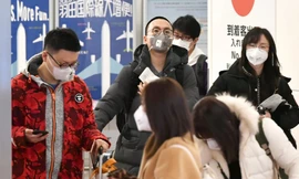 Nhật Bản đã có hơn 11.000 ca mắc COVID-19 và 265 người chết. Ảnh: Guardian