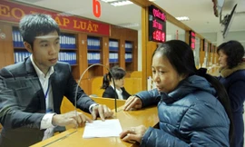 Không cần đổi chứng minh, sổ đỏ khi sáp nhập huyện, xã