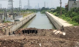 Mương dẫn nước trạm bơm Yên Nghĩa, một công trình đầu tư công đang bị chậm tiến độ do vướng cơ chế GPMB Ảnh: T.Đảng 