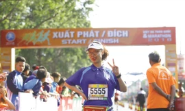 Nữ nhà báo Khương Xuân về đích “xinh tươi” cự ly 5 km tại giải Tiền Phong Marathon năm 2018 tại Buôn Ma Thuột ảnh: Như Ý