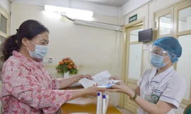 Người dân sử dụng thẻ BHYT điện tử trên ứng dụng VssID - BHXH số trong khám chữa bệnh thay thế thẻ giấy.