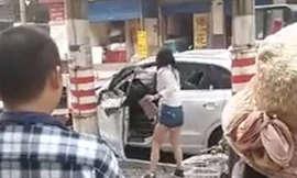 Người phụ nữ trút giận lên chiếc xe Audi Q3 hạng sang.