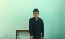 Nghi phạm Nguyễn Ngọc Viên và tang vật vụ án. Ảnh: Huy Hoàng