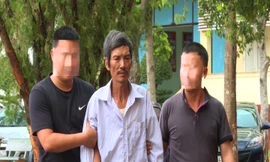 Công an dẫn giải Đặng Văn Sự về trụ sở