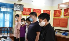 Các đối tượng trong đường dây cờ bạc vừa bị bắt khẩn cấp - Ảnh: Hoàng Long