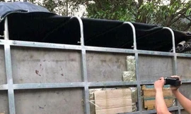 Phạm Xuân Lân (bìa trái) tự khai cùng em trai vận chuyển thuê ma túy cho ông Voòng *ảnh: TL