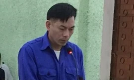 Bị cáo Thuận ra tòa, lĩnh án chung thân .Ảnh CB