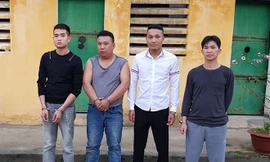 Tạm giữ hình sự một số đối tượng vi phạm về pháo .Ảnh: Việt Dũng 