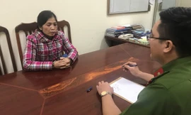 Đối tượng Lâm (bìa trái) khai nhận hành vi tại cơ quan công an .Ảnh: TL