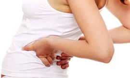 Đau lưng có thể là dấu hiệu ung thư buồng trứng