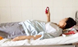 Đến chiều 10/5, sức khỏe của nữ bệnh nhân tiến triển tốt, giao tiếp được với người thân. Ảnh: Ái Nam (VnExpress).