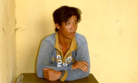 Nguyễn Thanh Tuấn tại cơ quan công an.