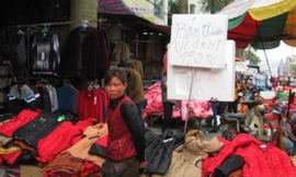 Bán tháo vốn, về quê ăn tết. Ảnh: Duy Chiến.