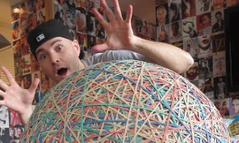 32 năm quấn sợi cao su thành quả bóng