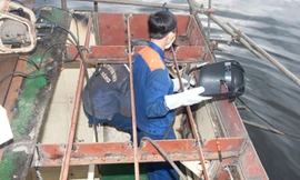 Trung Quốc hạ đặt giàn khoan trái phép trong vùng biển Việt Nam cùng các tàu tấn công gây thiệt hại cho lực lượng chấp pháp Việt Nam - Ảnh: Nguyễn Tú