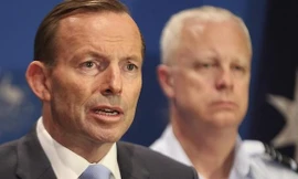 Thủ tướng Úc Tony Abbott (trái).