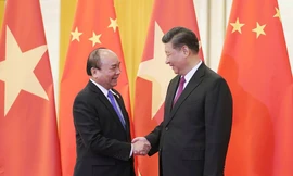 Thủ tướng Nguyễn Xuân Phúc hội kiến Chủ tịch Trung Quốc Tập Cận Bình. (Ảnh: Quang Hiếu)