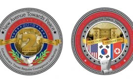 Hai mặt của loại đồng xu lưu niệm mới vừa được Nhà Trắng giới thiệu.