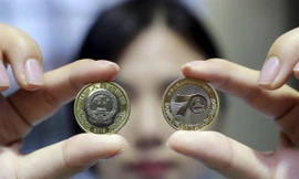 Trung Quốc phát hành đồng xu 10 tệ nhân kỷ niệm 70 năm quốc khánh. (Ảnh: Imagine China)