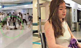 Bức ảnh người phụ nữ mang bầu nằm trên sàn nhà ga ở Hong Kong. (Ảnh: SCMP)