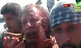 Hoãn chôn cất bí mật ông Gaddafi