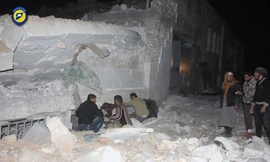 Hiện trường vụ không kích nhà thờ hôm 16/3 ở al-Jina, tây bắc Syria.