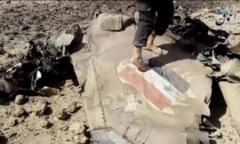 Một chiến đấu cơ của Syria rơi ở phía đông nam Damascus hôm 22/4 vừa qua. Ảnh: Reuters