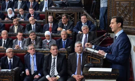 Tổng thống Syria Bashar al-Assad trong một bài phát biểu trước Quốc hội tại Damascus hồi tuần trước. Ảnh: NYTimes