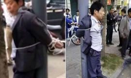 Cặp vợ chồng đánh đập, trói kẻ định quấy rối con gái vào cột đèn trước khi báo cảnh sát.