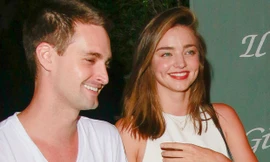 Miranda Kerr rạng rỡ bên bạn trai kém tuổi. Ảnh: Celebuzz