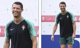 Cristiano Ronaldo cười tít mắt trong buổi tập trước trận gặp Morrocco.