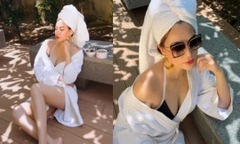 Trương Ngọc Ánh hờ hững quyến rũ bên bể bơi 