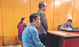 Các bị cáo tại phiên tòa hôm qua 3/2. Ảnh: T.M