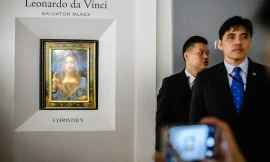 Người đàn ông đeo cà vạt xanh trong ảnh được cho là cựu sĩ quan CIA Jerry Chun Shing Lee