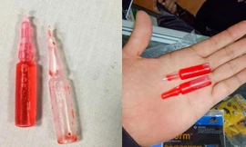 Hai em nhỏ ở Nghệ An nhập viện sau khi uống nhầm dung dịch lạ màu hồng
