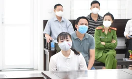 Các bị cáo Thủy, Nam tại tòa.