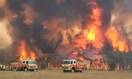 Lực lượng chức năng Úc không thể kiểm soát tình hình cháy rừng ở nhiều khu vực. (Ảnh: BBC)