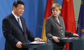 Thủ tướng Đức Angela Merkel trong một cuộc họp báo chung với Chủ tịch Trung Quốc Tập Cận BÌnh. (Ảnh: AP)