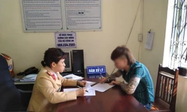 Khá tại trụ sở công an.