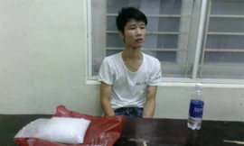 Hoàng Thế Mạnh khi bị bắt cùng tang vật.