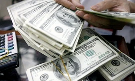 Thấy gì từ việc Ngân hàng Nhà nước tăng tỷ giá?