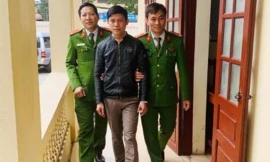 Hà Khải tại cơ quan công an