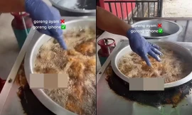 Đang chiên gà cho khách thì chủ quán làm rơi iPhone vào chảo dầu sôi, kết quả ra sao?