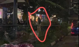 Người đi đường chụp được hình "bóng trắng" kỳ bí, phóng to ảnh mới rất bất ngờ